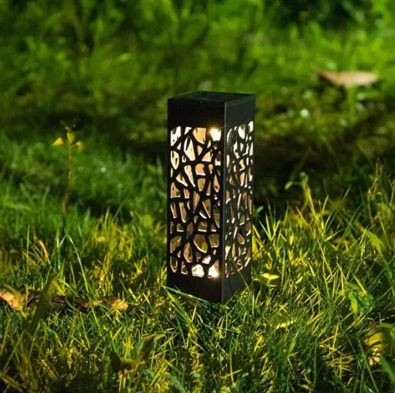 Solar powered vintage garden light in garden