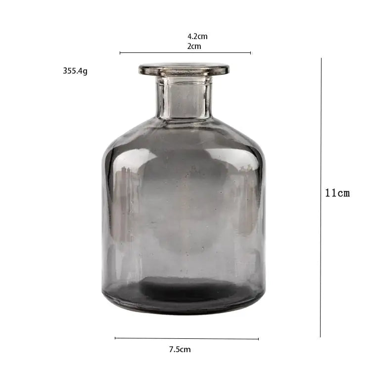 Close-up of Nordic glass flower vase decor with transparent glass