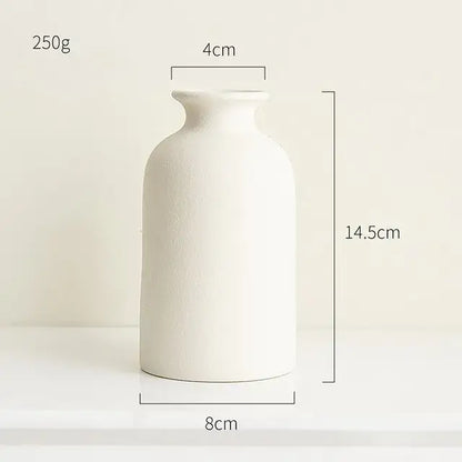 Minimalist simple ceramic vase decor with flowers