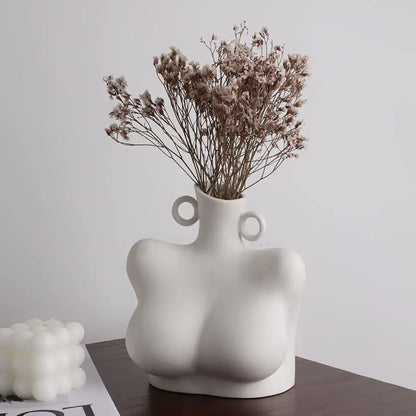 Ceramic sculpture vase with flowers