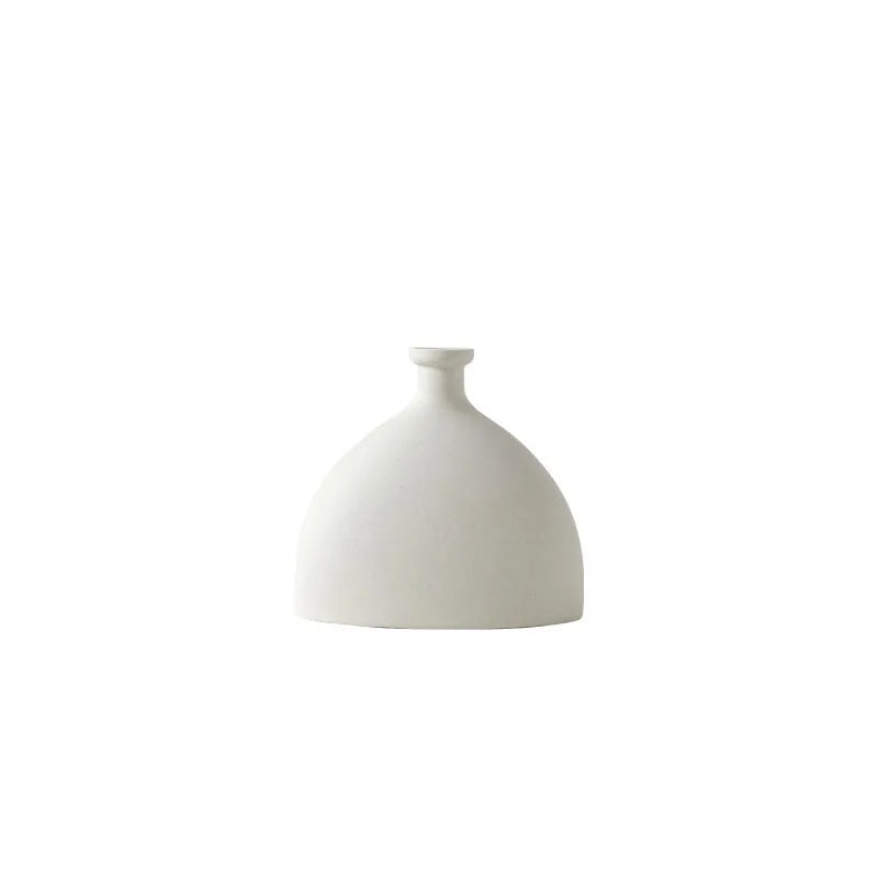 Nordic ceramic vase decor in minimalistic design with smooth matte finish for modern home accents.