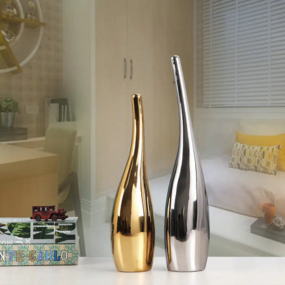 Nordic gold ceramic vases displaying elegant minimalist design for home decor.